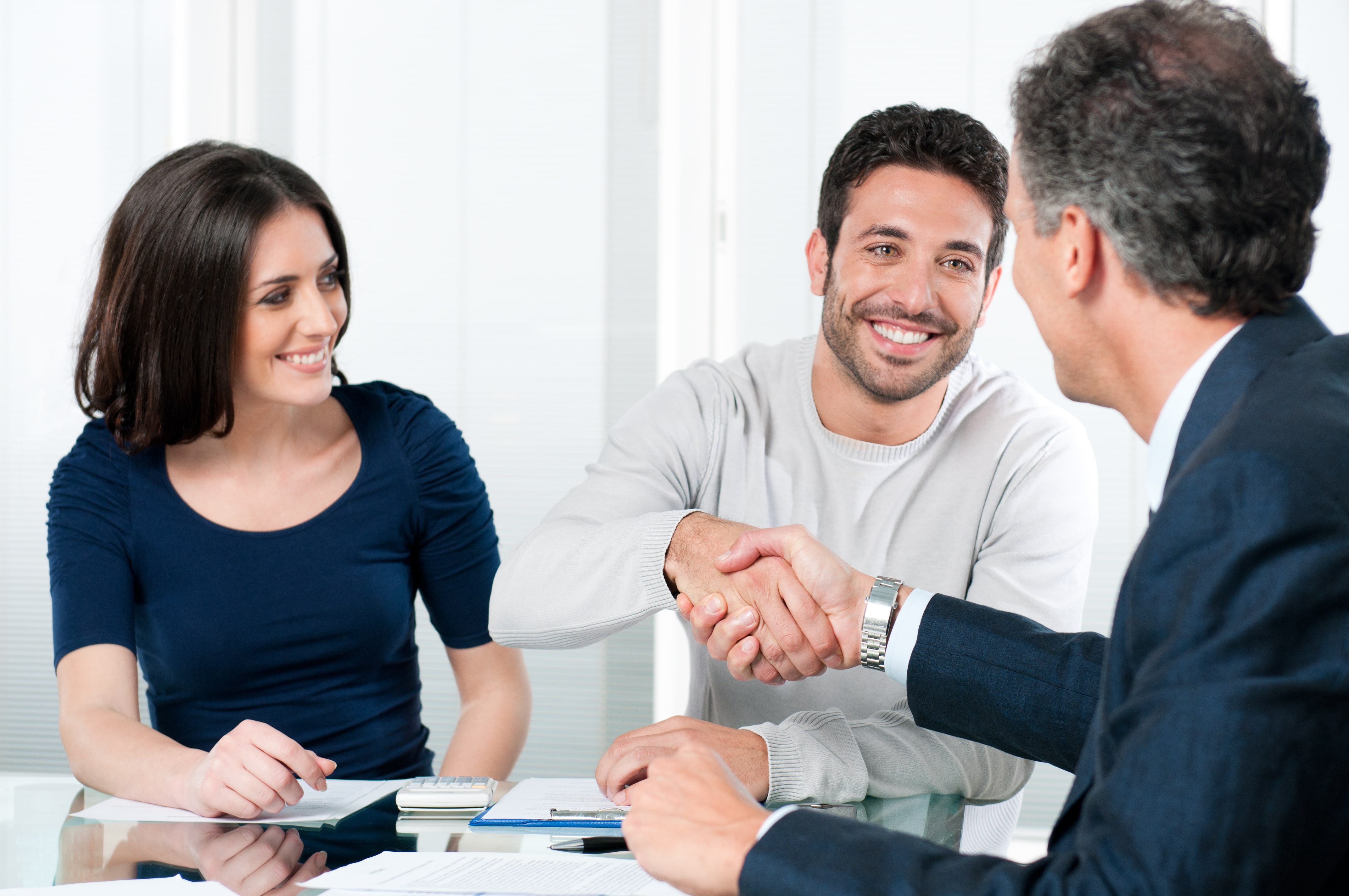 couple discussing their prenup with a lawyer